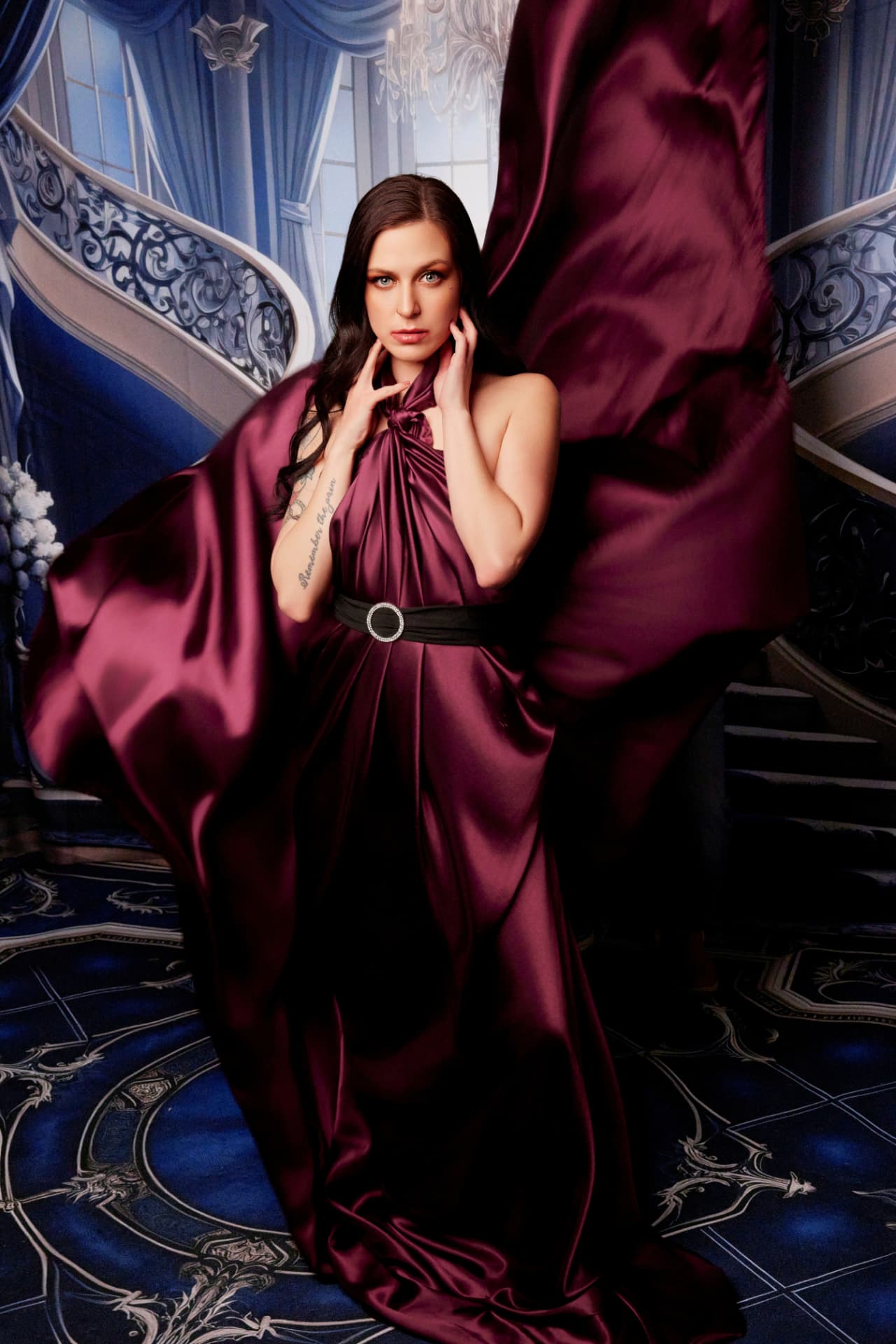 Editorial burgundy satin gown portrait on a grand staircase by Just Because Photography Studio, Mattoon, IL